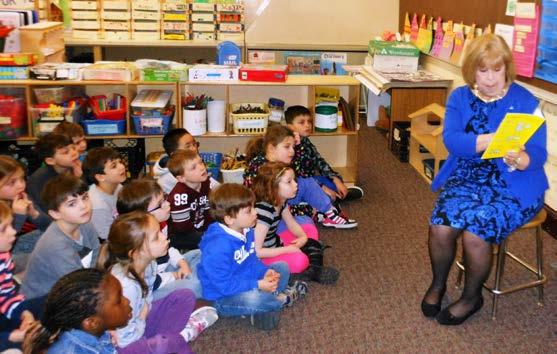 Pictured (L-R): Butler School Kindergarteners, Kathleen Darcy, small business development officer, Cambridge Savings Bank