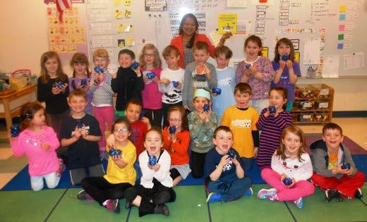 Pictured (center): Nilmini Perera, personal banker, Cambridge Savings Bank; Dallin Elementary School Kindergarteners Pictured (center): Bob Clark, personal banker, Cambridge Savings Bank; Dallin Elementary School Kindergarteners